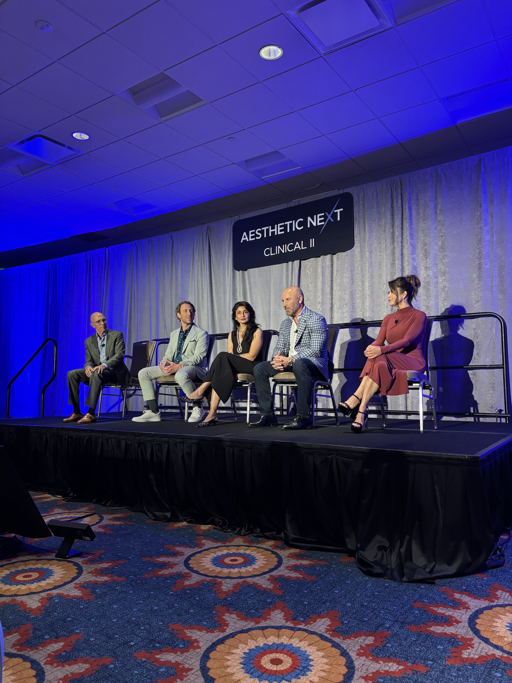 Dr. Mark Tager participating in an Aesthetic Next clinical panel